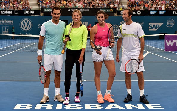 Tennis players Roger Federer (L) of Switzerland, Radek Stepanek (R) of the Czech Republic, Garbine Muguruza of Spain (2nd R) and Victoria Azarenka of Belarus (2nd L) pose on court before the start of the Brisbane International tennis tournament on January 3,     2016. AFP PHOTO / Saeed KHAN -- IMAGE RESTRICTED TO EDITORIAL USE - STRICTLY NO COMMERCIAL USE / AFP / SAEED KHAN        (Photo credit should read SAEED KHAN/AFP/Getty Images)