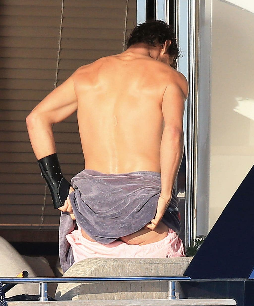 Exclusive... 52107234 Tennis star Rafael Nadal is spotted showing off his butt while changing on a yacht during his vacation in Ibiza, Spain on June 23, 2016. FameFlynet, Inc - Beverly Hills, CA, USA - +1 (310) 505-9876 RESTRICTIONS APPLY: USA/AUSTRALIA ONLY