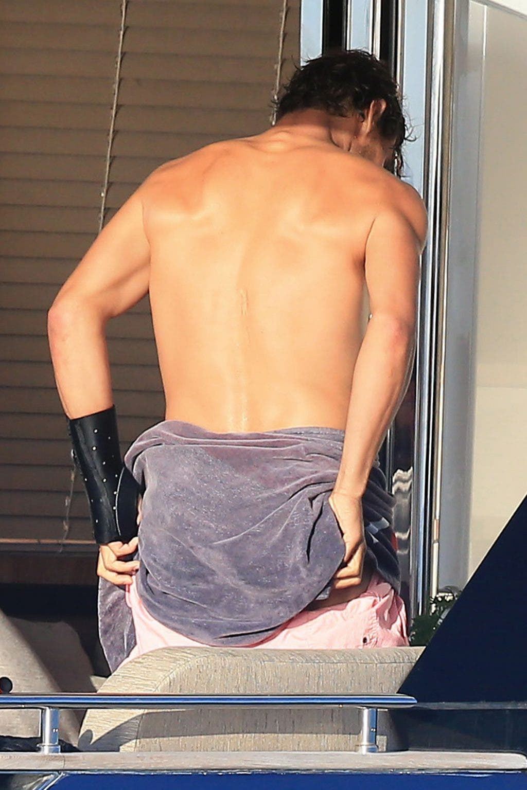 Exclusive... 52107231 Tennis star Rafael Nadal is spotted showing off his butt while changing on a yacht during his vacation in Ibiza, Spain on June 23, 2016. FameFlynet, Inc - Beverly Hills, CA, USA - +1 (310) 505-9876 RESTRICTIONS APPLY: USA/AUSTRALIA ONLY