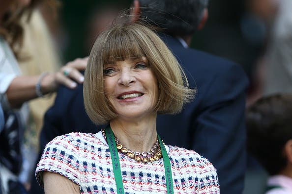 US Vogue editor Anna Wintour takes her seat in the royal box before the men's singles quarter-final match between Switzerland's Roger Federer and Croatia's Marin Cilic on the tenth day of the 2016 Wimbledon Championships at The All England Lawn Tennis Club in Wimbledon, southwest London, on July 6, 2016. / AFP / JUSTIN TALLIS / RESTRICTED TO EDITORIAL USE (Photo credit should read JUSTIN TALLIS/AFP/Getty Images)