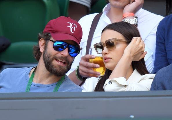 LONDON, ENGLAND - JULY 06: Bradley Cooper and Irina Shayk attend day nine of the Wimbledon Tennis Championships at Wimbledon on July 06, 2016 in London, England. (Photo by Karwai Tang/WireImage)