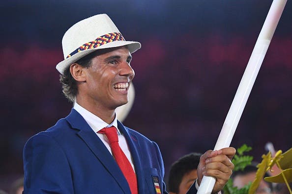 Spain's flag bearer Rafael Nadal leads  the delegation during the opening ceremony of the Rio 2016 Olympic Games at the Maracana stadium in Rio de Janeiro on August 5, 2016. / AFP / Leon NEAL        (Photo credit should read LEON NEAL/AFP/Getty Images)