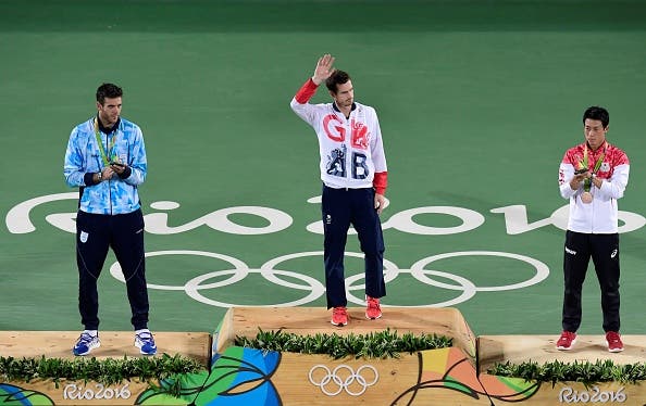 Gold medallist Britain's Andy Murray (C), silver medallist Argentina's Juan Martin Del Potro (L), bronze medallist Japan's Kei Nishikori pose on the podium of the men's singles gold medal tennis event at the Olympic Tennis Centre of the Rio 2016 Olympic Games in Rio de Janeiro on August 14, 2016. / AFP / JAVIER SORIANO (Photo credit should read JAVIER SORIANO/AFP/Getty Images)
