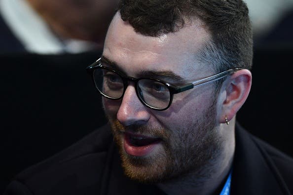 British singer Sam Smith watches Serbia's Novak Djokovic play against Britain's Andy Murray during the men's singles final on the eighth and final day of the ATP World Tour Finals tennis tournament in London on November 20, 2016. / AFP / Glyn KIRK        (Photo credit should read GLYN KIRK/AFP/Getty Images)